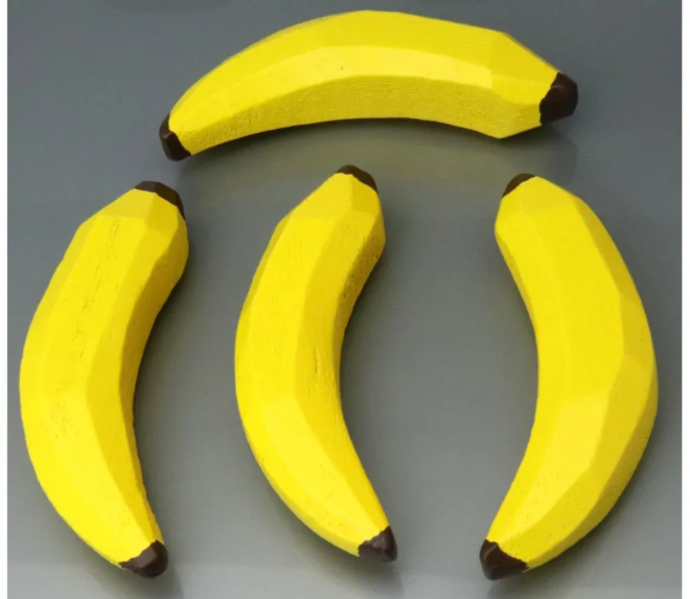 Banane en bois jaune de 8.5 x 1,8 cm jouet