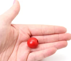 Perle bois couleur rouge de 2 cm trou de 7 mm unité