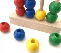 Perle bois couleur rouge de 2 cm trou de 7 mm unité