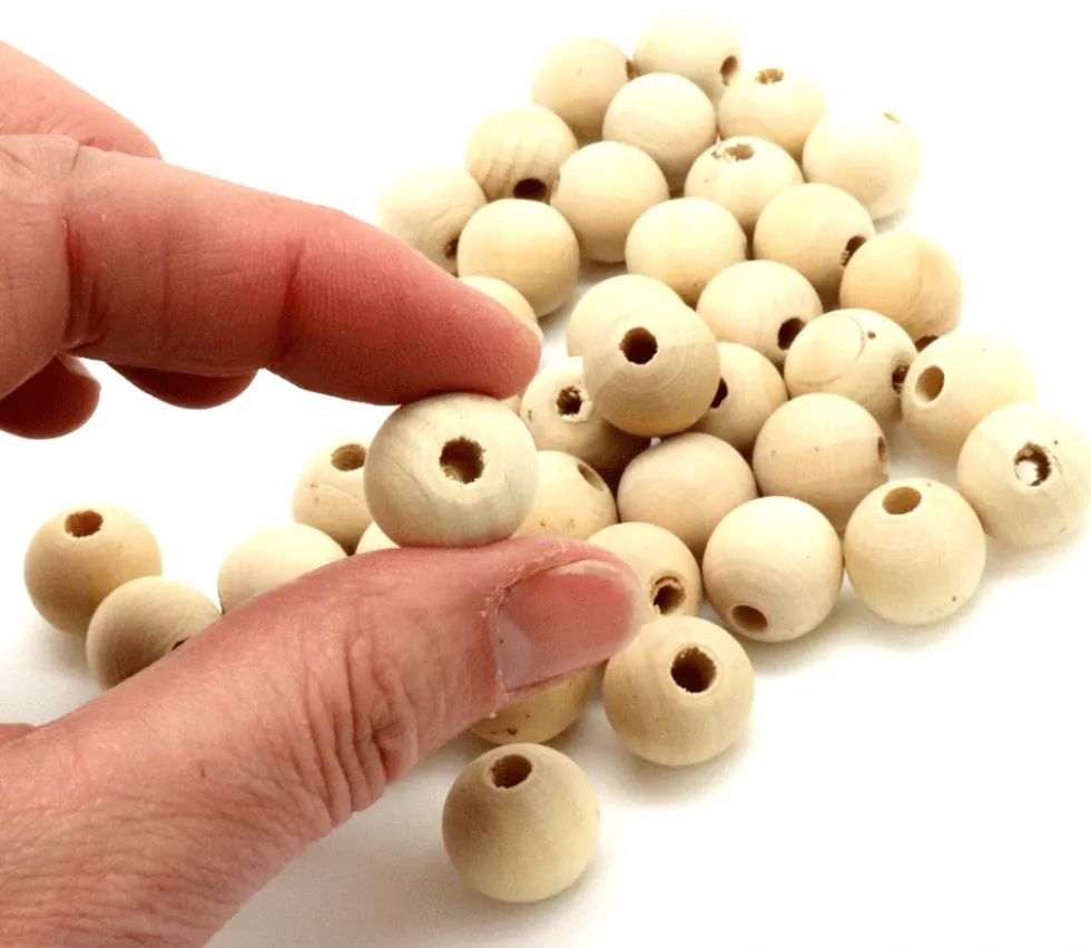 40 perles 1.5 cm trouée en bois 15 mm - trou de 4 mm