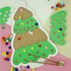 Puzzle bois sapin de Noël avec 65 pompons