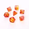 Set 7 dés multi-faces rouge et jaune translucide chiffres dorés