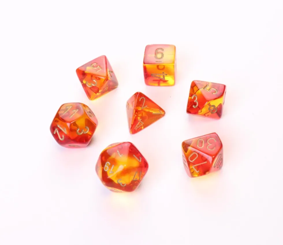 Set 7 dés multi-faces rouge et jaune translucide chiffres dorés